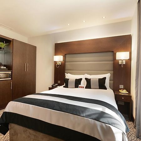 Отель Park Grand London Lancaster Gate Экстерьер фото A bedroom at the hotel